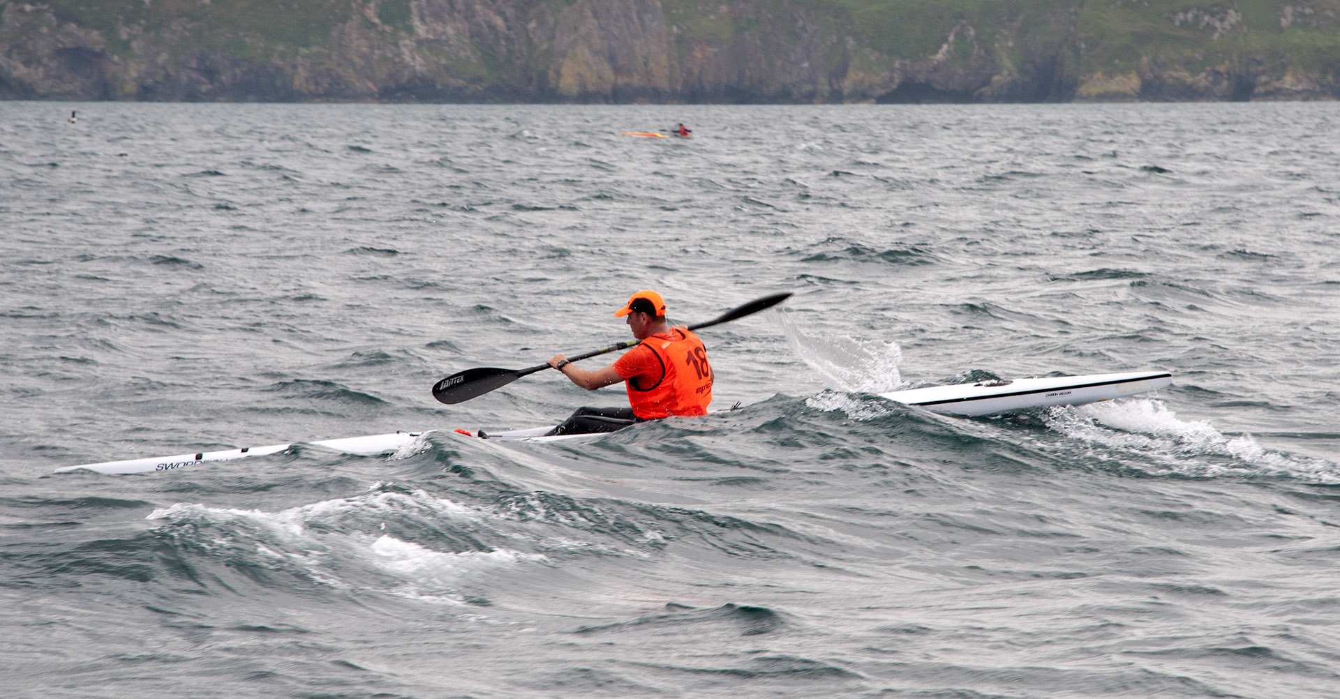 Surfski on a wave